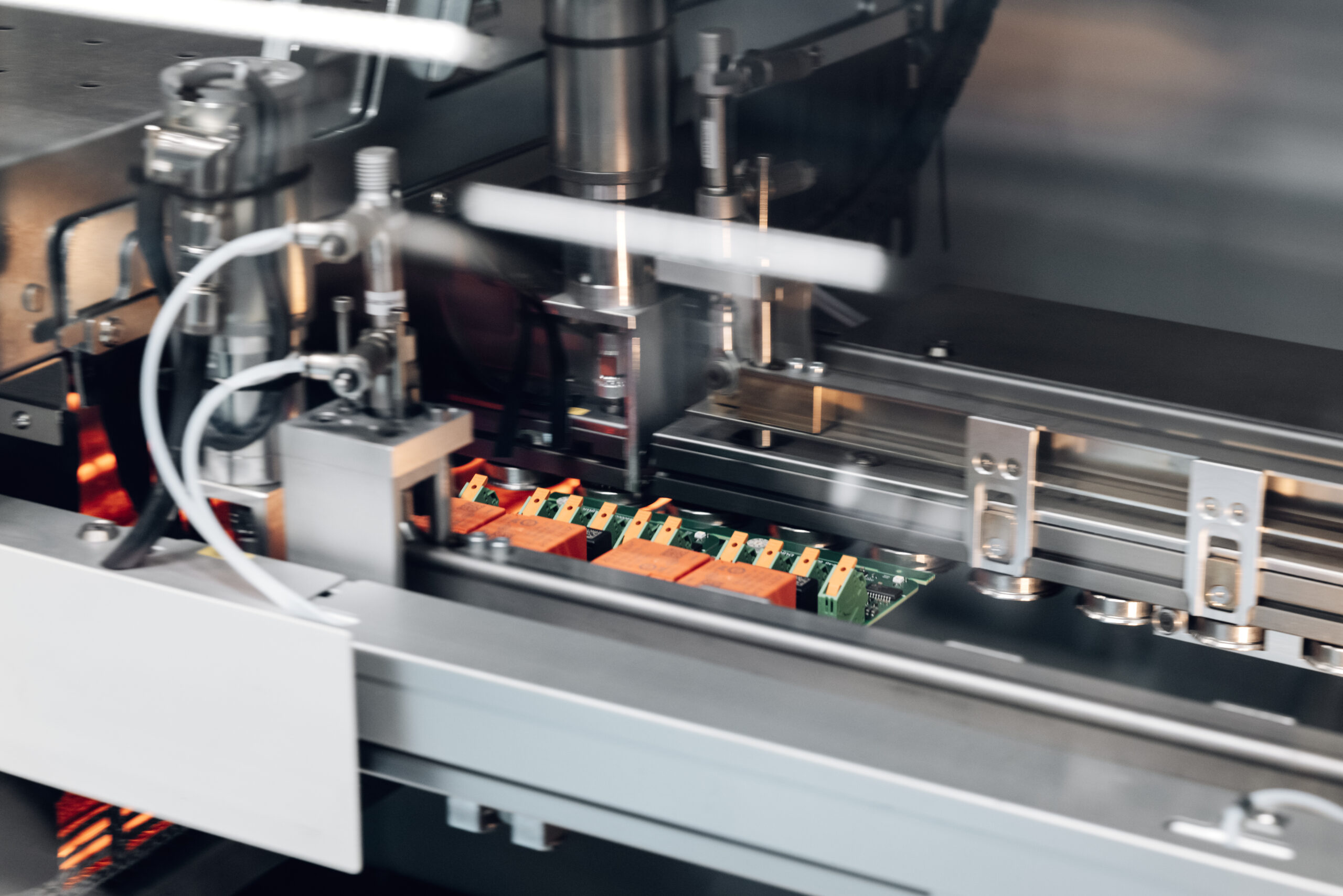 Automated electronics assembly line producing EV charger circuit boards for reliable, high-quality manufacturing