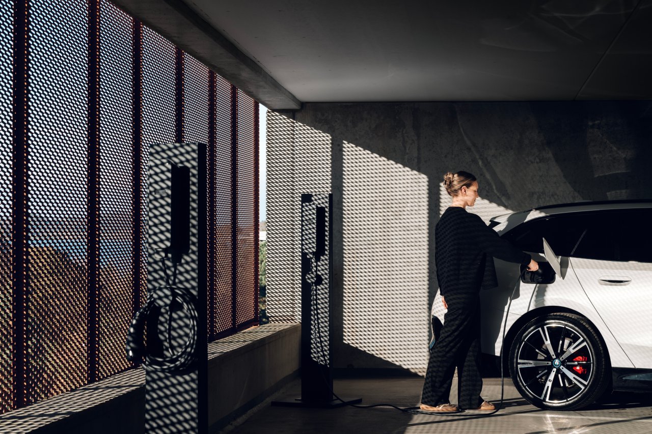 amina M CPO charger installed in residential garage for EV charging